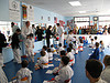 sensei Lois giving Tim his certificate